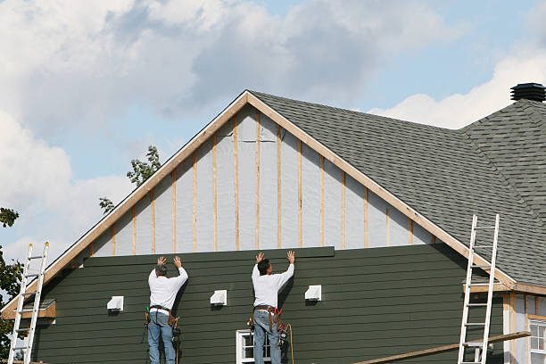 Professional Siding technician working in Whiteford, MD